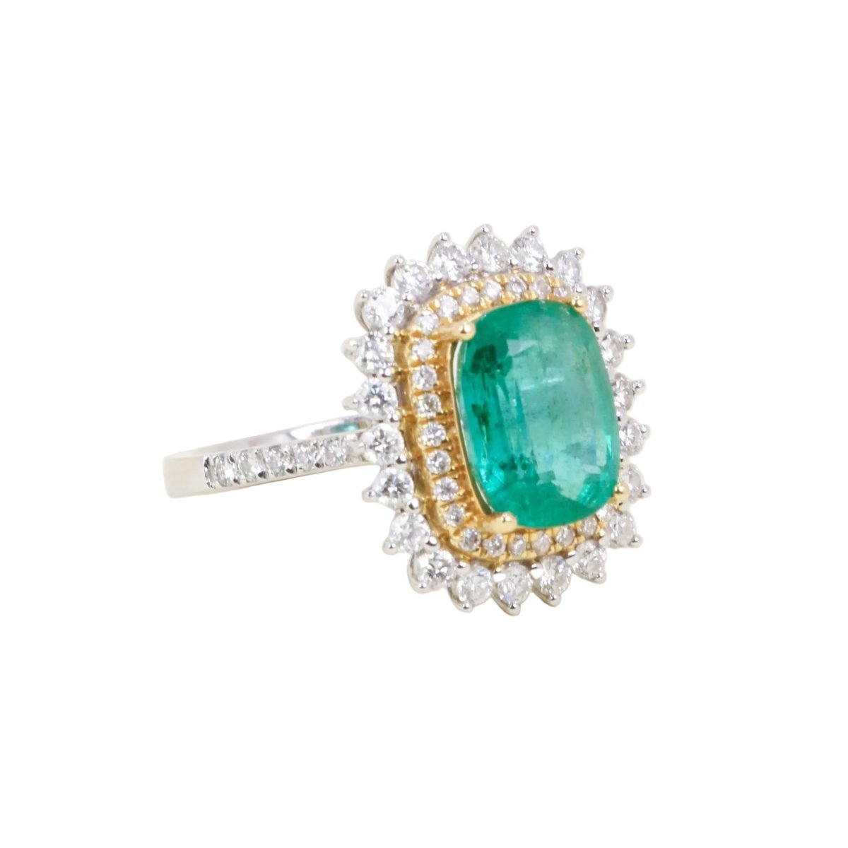 Bague Entourage en or blanc, or jaune, émeraude et diamants - Castafiore