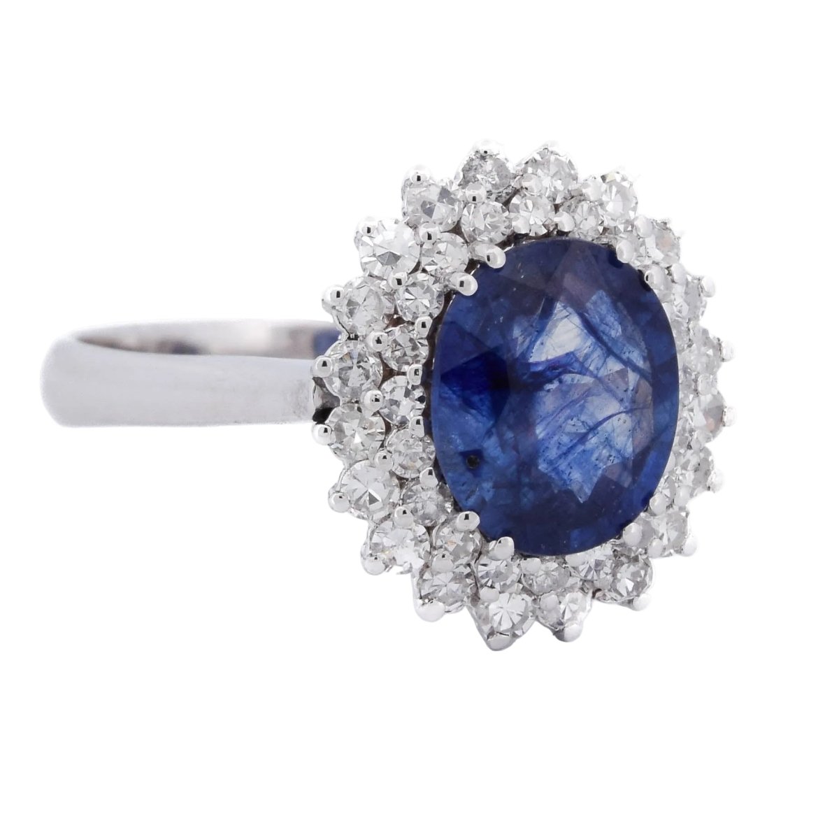 Bague Entourage en or blanc, saphir et diamants - Castafiore