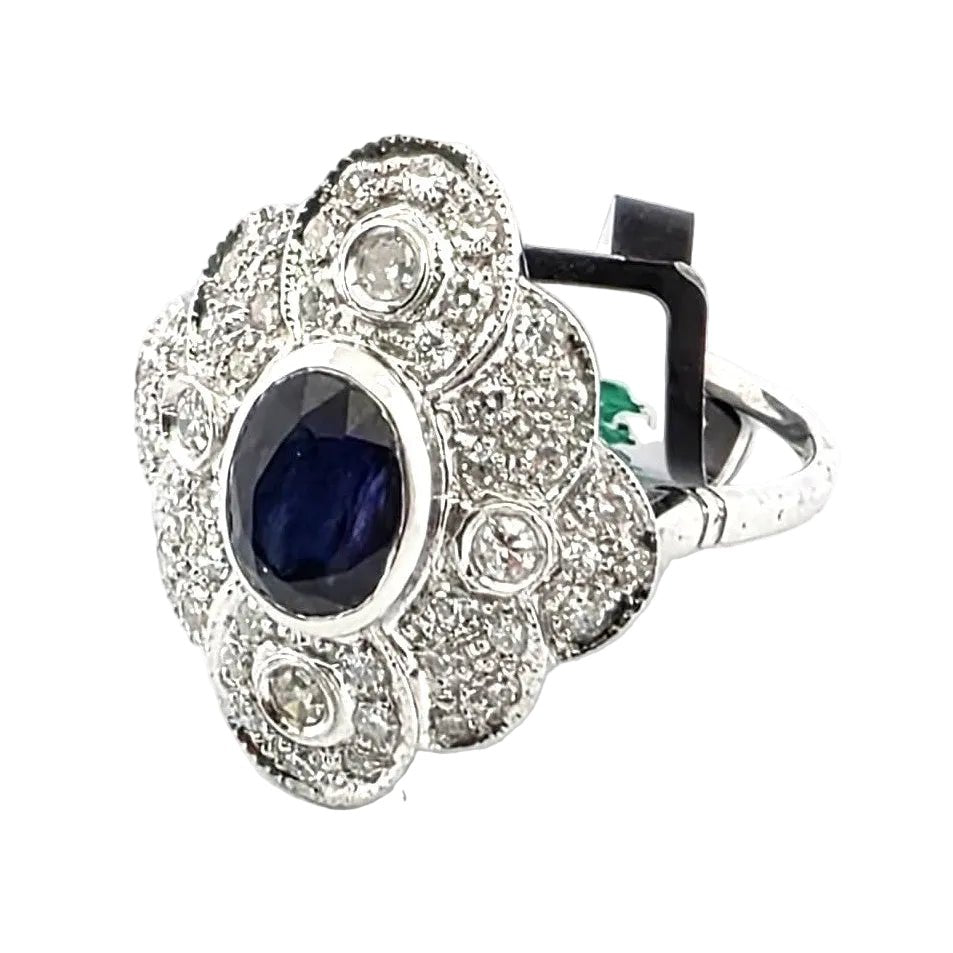 Bague Entourage en or blanc, saphir et diamants - Castafiore