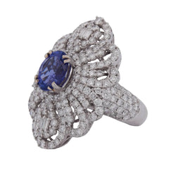Bague Entourage en or blanc, tanzanite et diamants - Castafiore