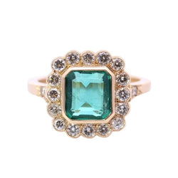 Bague Entourage en or jaune, émeraude et diamants - Castafiore