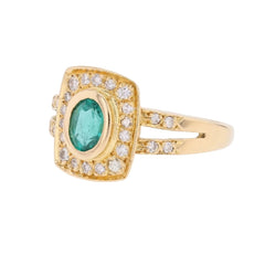 Bague Entourage en or jaune, émeraude et diamants - Castafiore