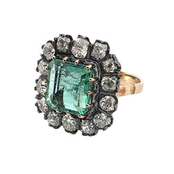 Bague Entourage en or jaune, émeraude et diamants - Castafiore