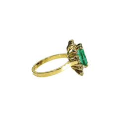 Bague Entourage en or jaune, émeraude, et diamants - Castafiore