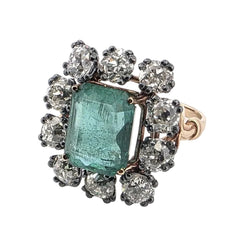 Bague Entourage en or jaune, émeraude et diamants - Castafiore