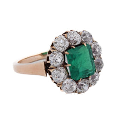 Bague Entourage en or jaune, émeraude et diamants - Castafiore