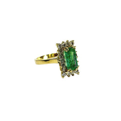 Bague Entourage en or jaune, émeraude, et diamants - Castafiore