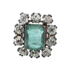 Bague Entourage en or jaune, émeraude et diamants - Castafiore