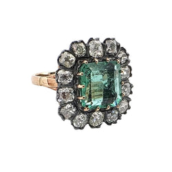 Bague Entourage en or jaune, émeraude et diamants - Castafiore