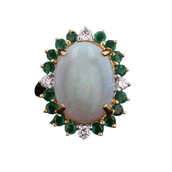 Bague Entourage en or jaune, opale, émeraudes et diamants - Castafiore