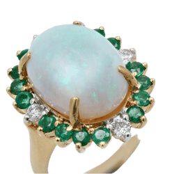 Bague Entourage en or jaune, opale, émeraudes et diamants - Castafiore