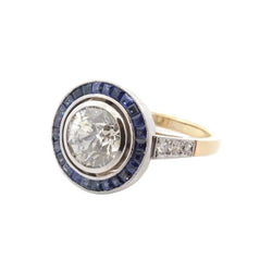 Bague Entourage en or jaune, platine, saphirs et diamants - Castafiore