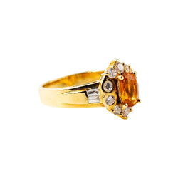 Bague Entourage en or jaune, saphir orange et diamants - Castafiore