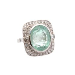 Bague Entourage en platine, émeraude et diamants - Castafiore