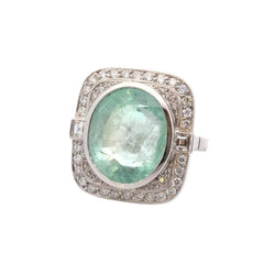 Bague Entourage en platine, émeraude et diamants - Castafiore