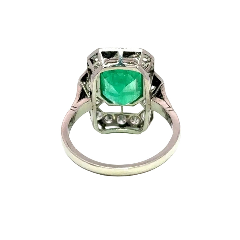 Bague Entourage en platine, émeraudes et diamants - Castafiore