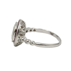 Bague Entourage en platine, rubis et diamants - Castafiore