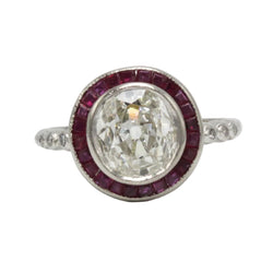 Bague Entourage en platine, rubis et diamants - Castafiore