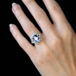 Bague Entourage en platine, saphir et diamants - Castafiore