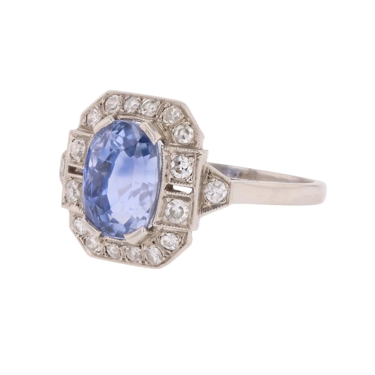 Bague Entourage en platine, saphir et diamants - Castafiore
