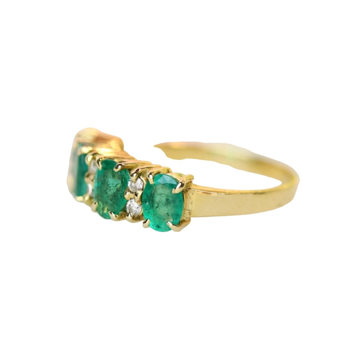 Bague Jarretière en or jaune, émeraudes et diaamnts - Castafiore