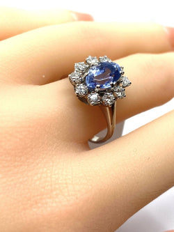 Bague marguerite en or blanc 18 carats, saphir et 10 diamants - Castafiore