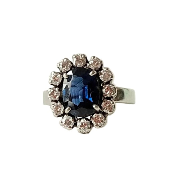 Bague Marguerite en or blanc, saphir, et diamants