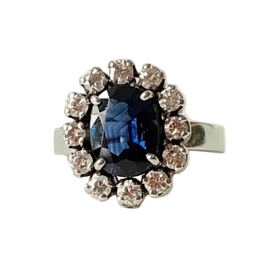Bague Marguerite en or blanc, saphir et diamants - Castafiore