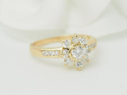 Bague marguerite en or jaune et diamants - Castafiore