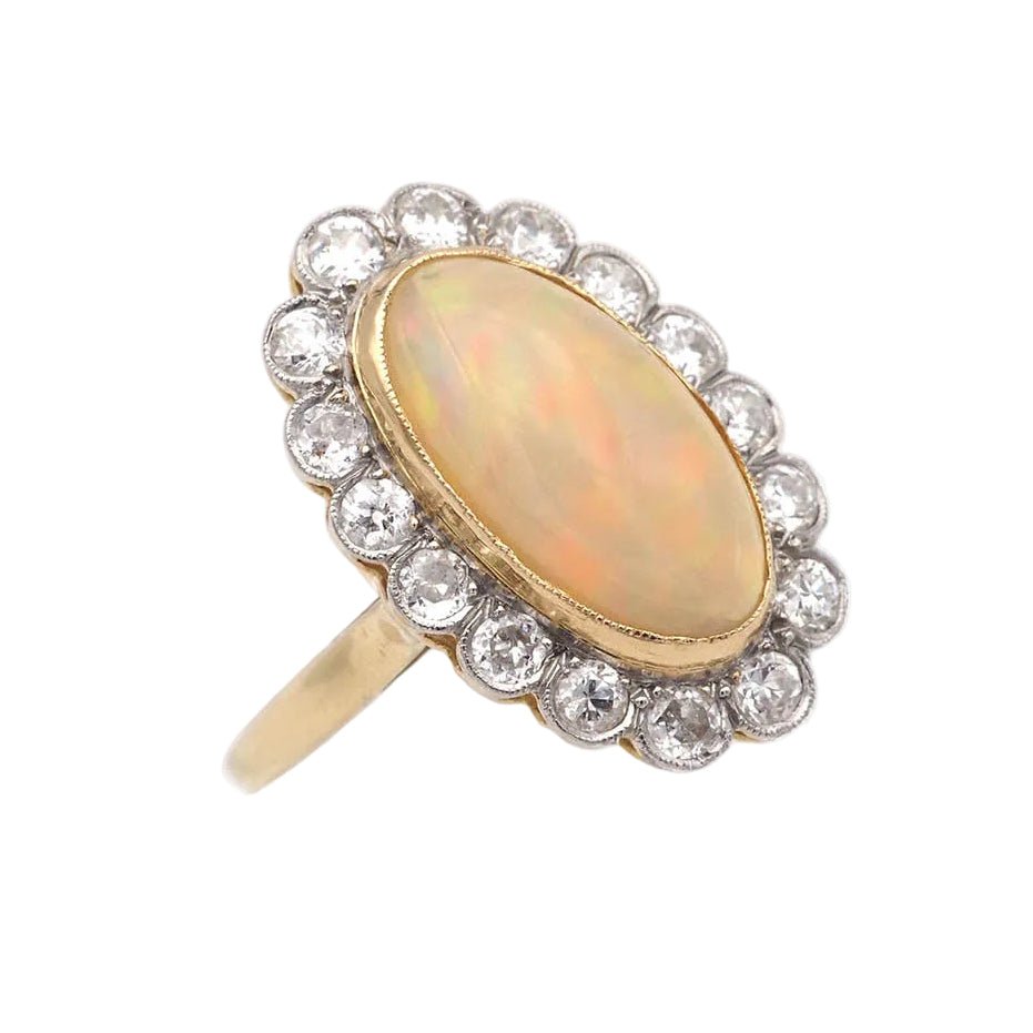 Bague Marguerite en or jaune, platine, opale et diamants - Castafiore