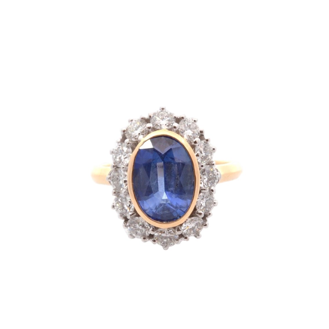 Bague Marguerite en or jaune, platine, saphir, et diamants - Castafiore