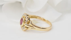 Bague marguerite en or jaune, rubis et diamants - Castafiore