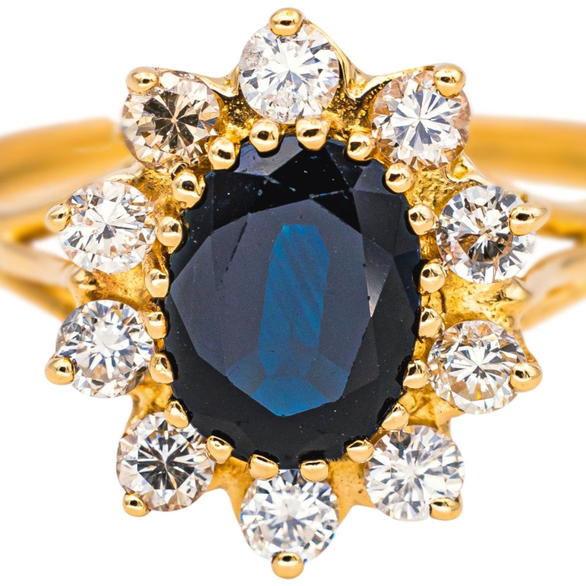 Bague Marguerite en or jaune, saphir et diamants - Castafiore