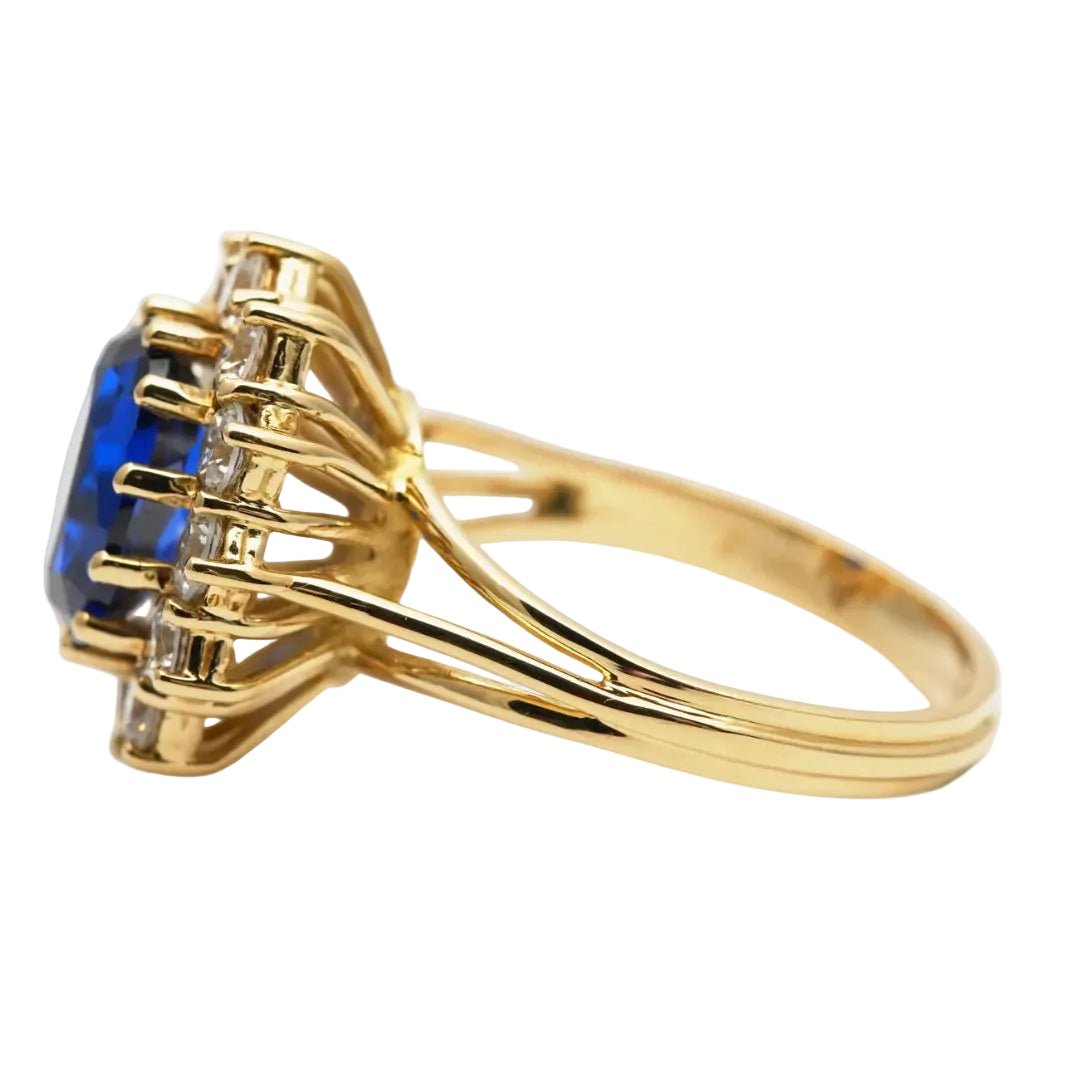 Bague Marguerite en or jaune, saphir et zirconiums - Castafiore