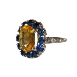 Bague Marguerite en or jaune, saphirs, et diamants - Castafiore