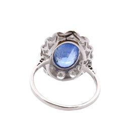 Bague Marguerite en platine, or jaune, saphir, et diamants - Castafiore