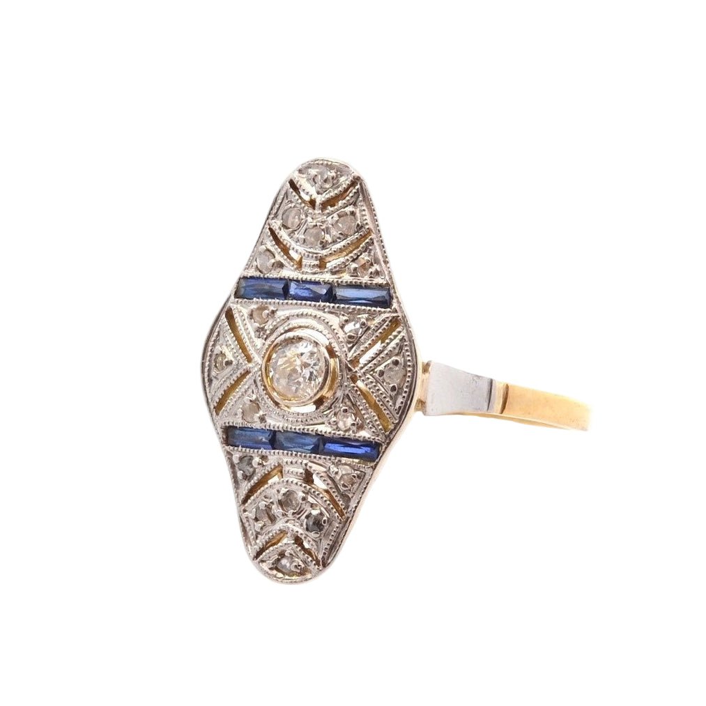 Bague Marquise en or jaune, platine, saphirs et diamants - Castafiore