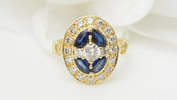 Bague ovale en or jaune, saphirs navette et diamants - Castafiore