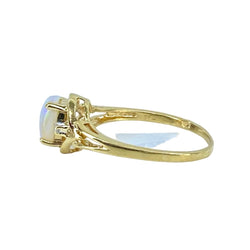 Bague Solitaire en or jaune, opale et diamants - Castafiore