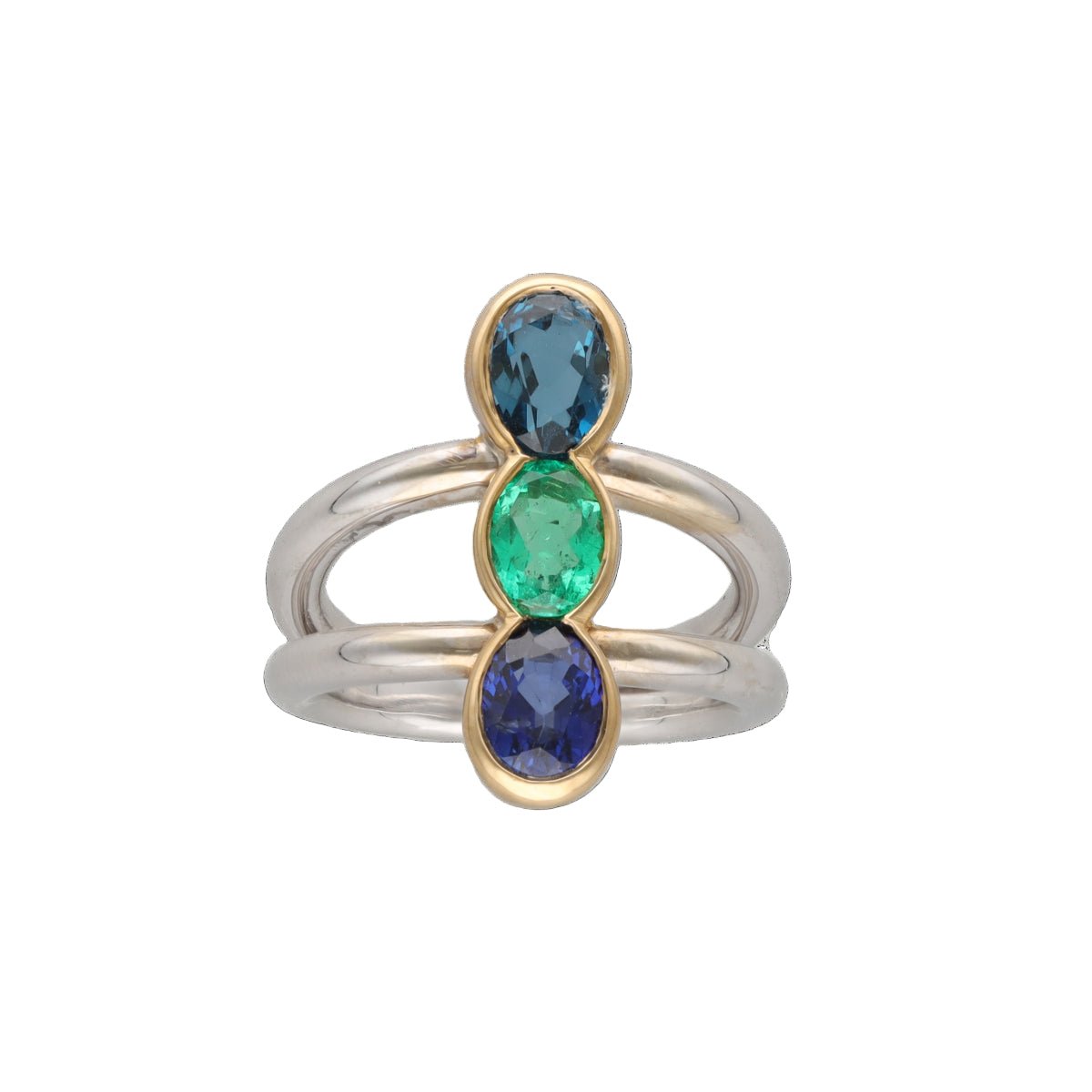 Bague Trilogie en or blanc, or jaune, émeraude, saphir et topaze - Castafiore