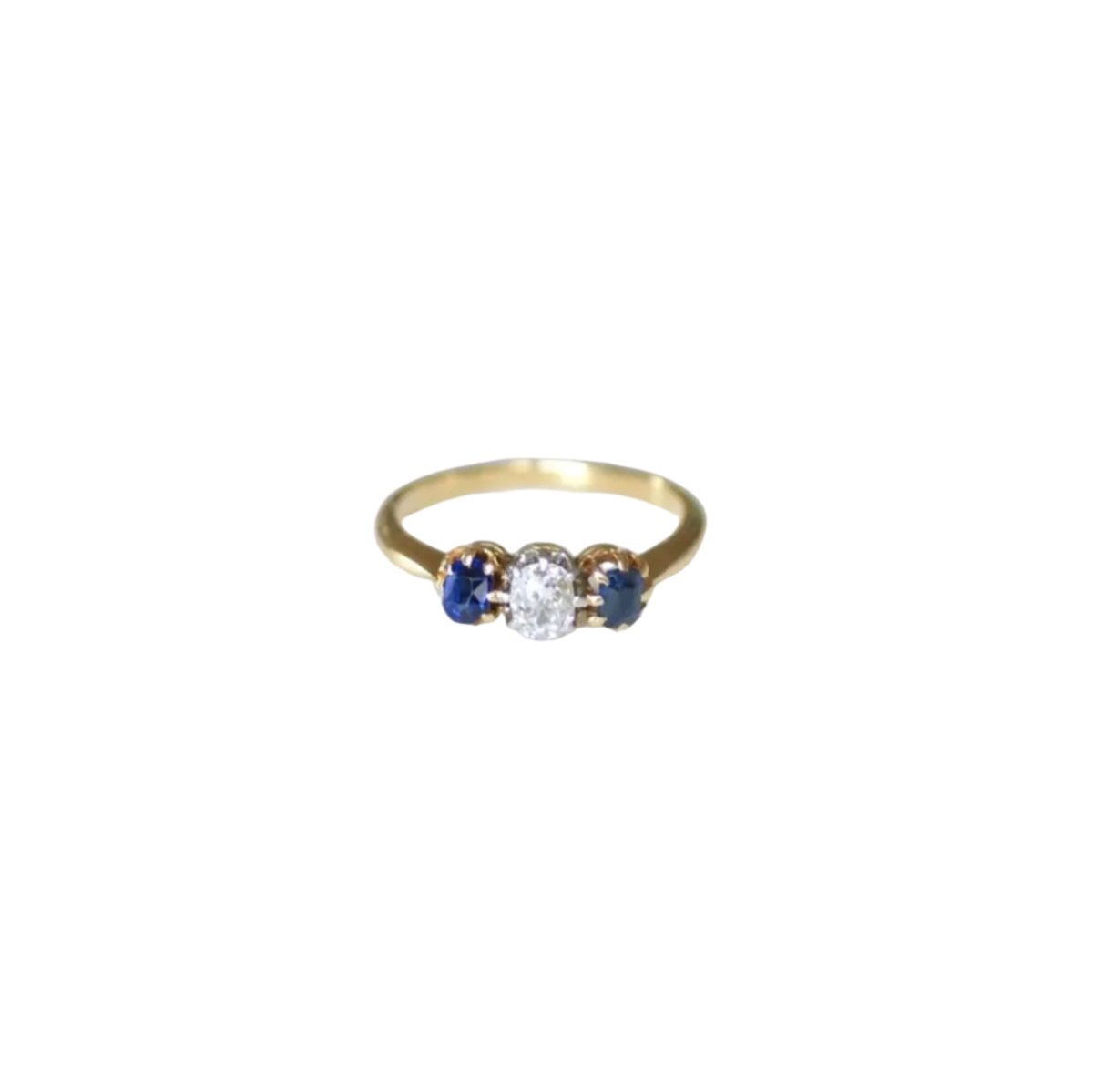 Bague Trilogie en or jaune, platine, saphirs, et diamant - Castafiore