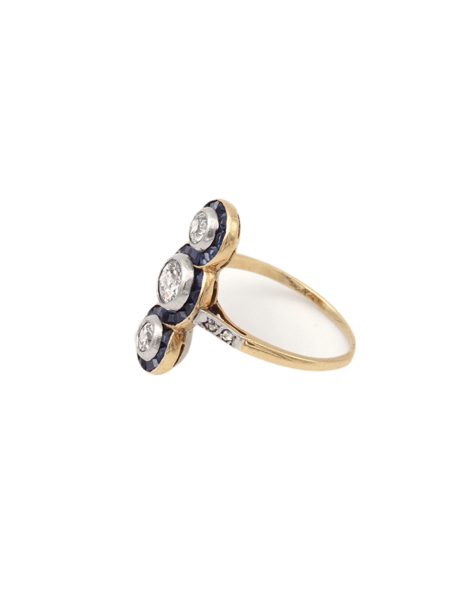 Bague Trilogie en or jaune, platine, saphirs et diamants - Castafiore