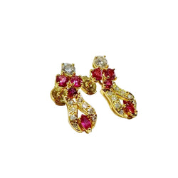 Boucle d'oreilles Pendantes en or jaune, rubis et diamants - Castafiore