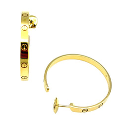 Boucles d'oreilles Créoles CARTIER "Love" en or jaune - Castafiore