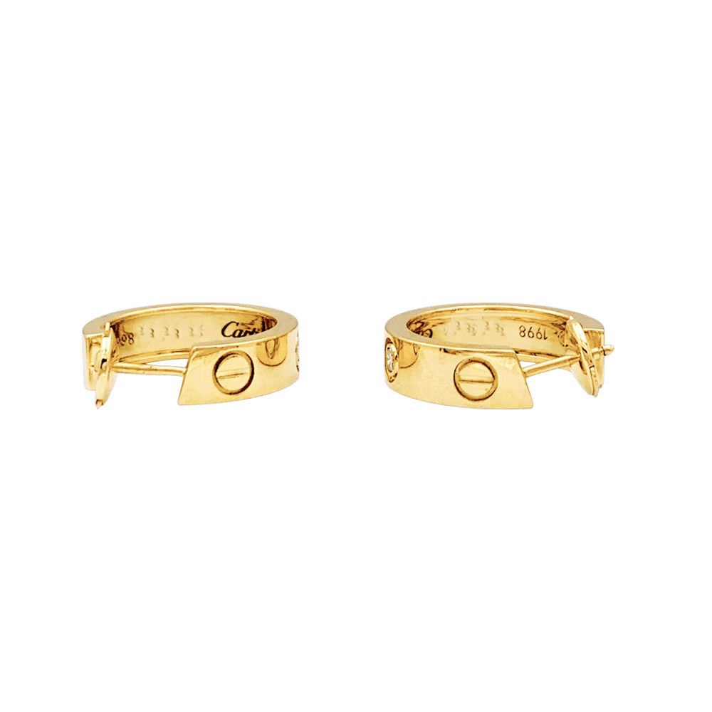 Boucles d'oreilles Créoles CARTIER "Love" en or jaune et diamants - Castafiore