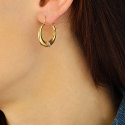 Boucles d'oreilles Créoles en or jaune et diamants - Castafiore