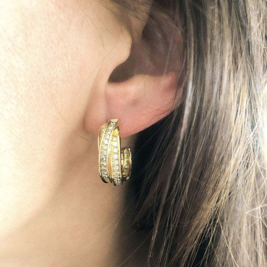 Boucles d'oreilles or jaune et diamant de la maison Cartier modèle Trinity - Castafiore