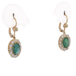 Boucles d'oreilles Pendantes en or jaune, émeraudes et diamants - Castafiore