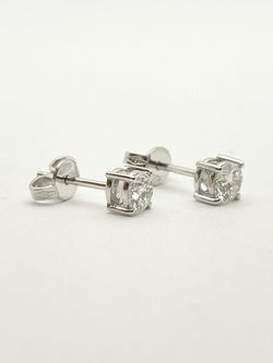 Boucles d'oreilles puces en or blanc et diamants naturels - Castafiore