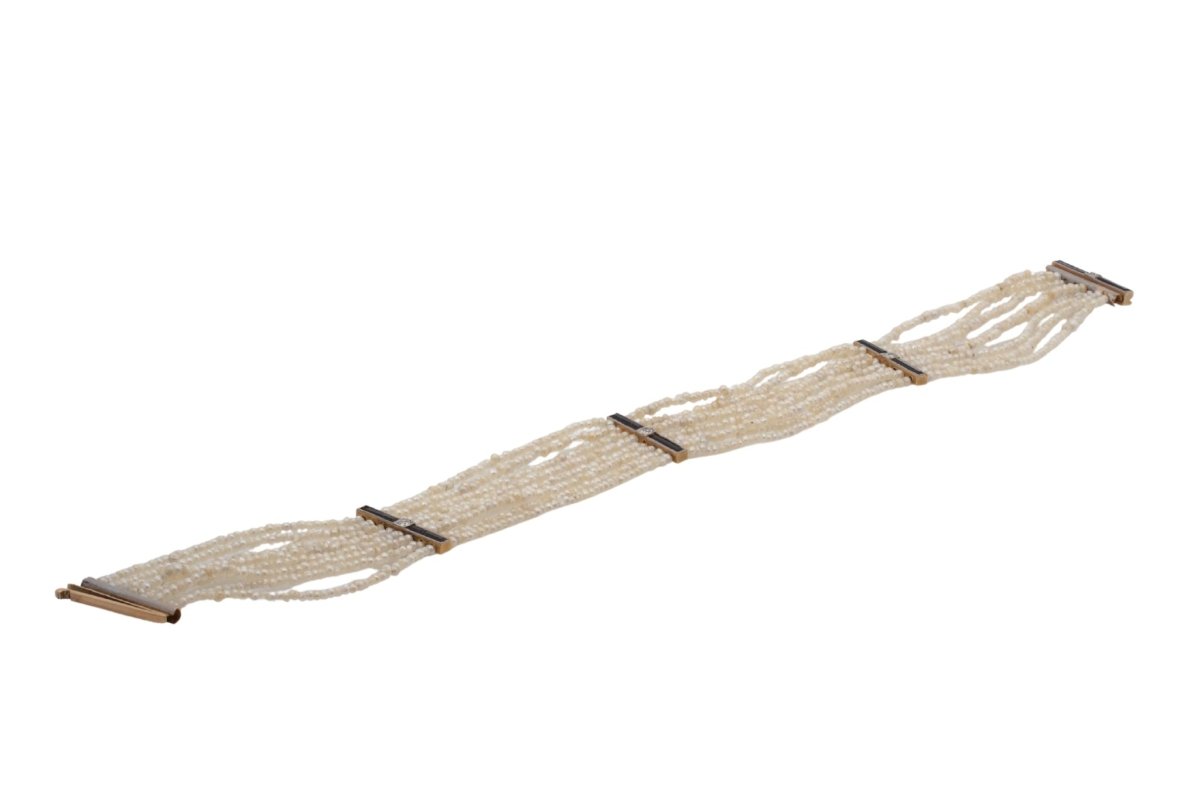 Bracelet ancien en or jaune avec perles fines, onyx et diamants - Castafiore